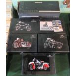 A collection of five vintage motorcycles from the Minichamps collection,