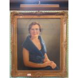 J Lawrence Baker, a mid-20th century gilt framed oil on canvas, portrait of an elegant lady,