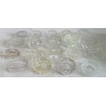 A collection of twenty 19th century cut and moulded glass table salts.