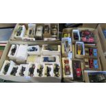 Three boxes containing a large quantity of models to include: American trucks, Army vehicles,