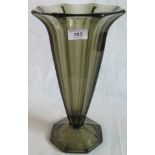 A contemporary smoked glass vase.