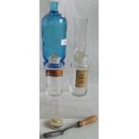 A collection of chemists' bottles and other related items.
