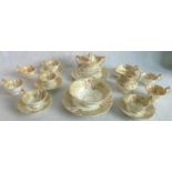 A quantity of Davenport china with gilt and floral decoration, on a white ground,