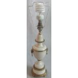 A single marble and gilt metal table lamp.