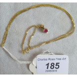 A 9ct gold and ruby necklace.