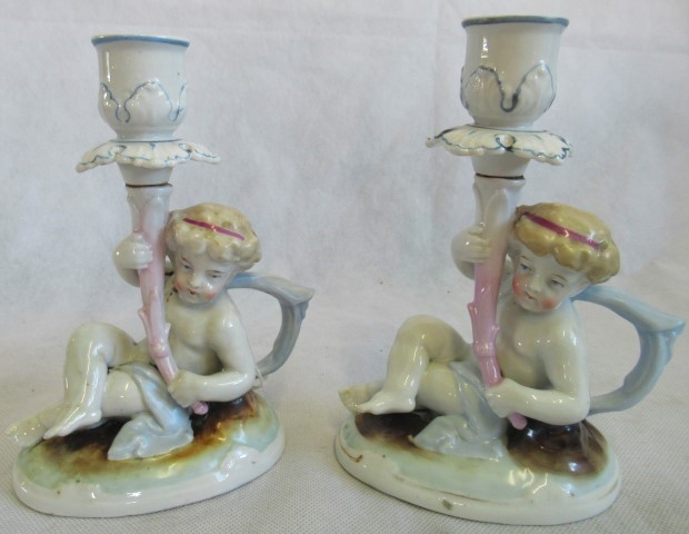 A pair of 19th century Conta & Boehme porcelain figural candlesticks.