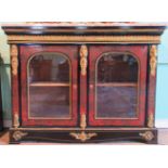 A 19th century ebonised credenza, having boulle work framed double glazed doors,