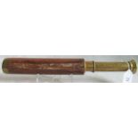 A WWI three drawer brass spotting scope with calf grip,