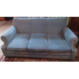 An upholstered three seater settee.