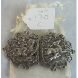 A cast silver stag decorated nurses buckle.