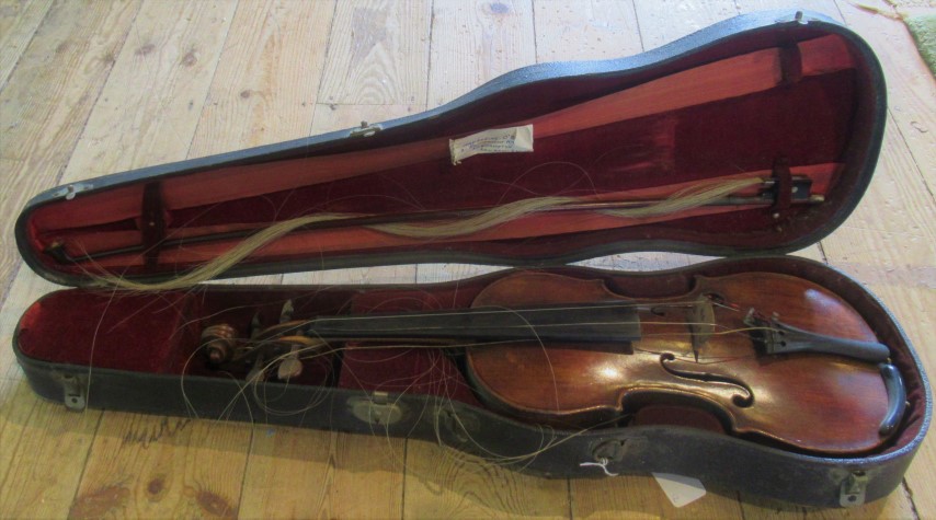 A cased violin, together with a Hill & Son bow.