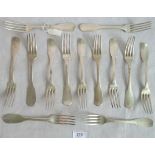 A collection of thirteen French silver table forks.