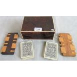A 20th century tortoiseshell case containing a Bezique card game.