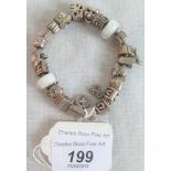 A Pandora charm bracelet, containing approximately 20 various charms.