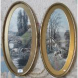 A pair of early 20th century oval gilt framed and glazed over-painted prints,