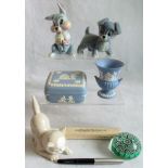 A box containing seven miscellaneous items,