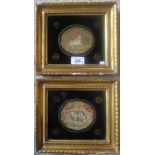 A pair of early 19th century gilt framed silk work pictures, depicting a lap dog and seated cat,