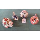 A collection of four Royal Crown Derby animals, to include: frog,