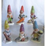 A collection of six Goebel figures, depicting garden gnomes.