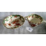 An 18th century Derby porcelain 'Jabberwocky pattern', two handled chocolate cup & saucer.