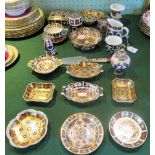 A large collection of Royal Crown Derby table and cabinet china, to include: dishes, cups,