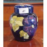 A Moorcroft ginger jar, decorated in the Pansy pattern.