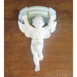 A 19th century Minton sage and white porcelain cherub wall bracket.