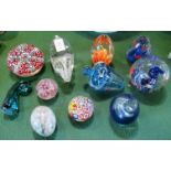A collection of eleven various paperweights.