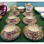 A Royal Crown Derby six sitting tea service, comprising: teapot, sugar bowl,