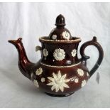 A treacle glazed Bargee teapot.