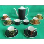 A Susie Cooper coffee service, Carnaby Daisy pattern, comprising: six coffee cans & saucers,