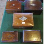 A collection of five miscellaneous mahogany, walnut and rosewood jewellery boxes.