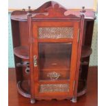 An Edwardian oak hanging corner smoker's cabinet.