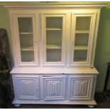 A large mahogany white painted cupboard bookcase,