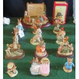 A collection of fourteen various figures, to include: Royal Doulton Bunnykins,