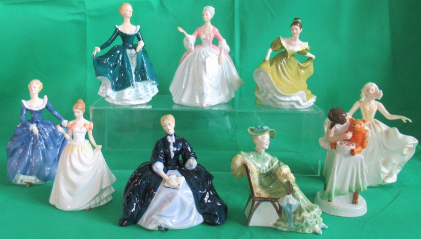 A collection of nine Royal Doulton figurines, to include: Laurianne HN2719, Ascot HN2356,