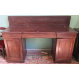 A Victorian mahogany inverted break-front twin bed pedestal sideboard.