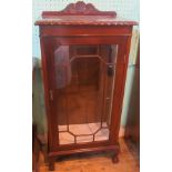 An Edwardian single drawer china cabinet,