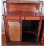 A 19th century rosewood chiffonier, the shelved super-structure above two mirrored doors.