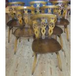 A set of six ercol dining chairs.