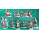 A collection of fourteen various Goebel figurines.