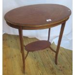 An Edwardian mahogany and inlaid two tier occasional table.