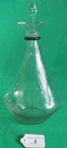 A Lalique decanter and stopper.