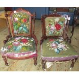 Two Victorian mahogany framed nursing chairs with gross point needlework upholstery.