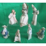 A collection of seven various Lladro figurines, to include: Needlework Lady,
