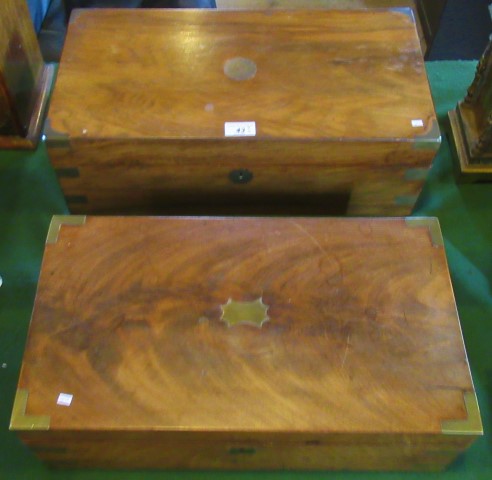 Two mahogany and brass bound writing slopes, one lacking interior.