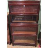 A 20th century Angus four tier bookcase.