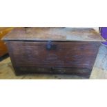 A 19th century carved oak two drawer mule chest.