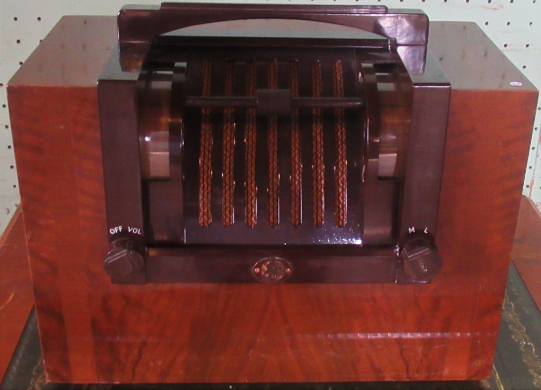 A McMichael model 808 radio on swivel base.