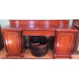 A large Victorian mahogany inverted breakfront pedestal sideboard,